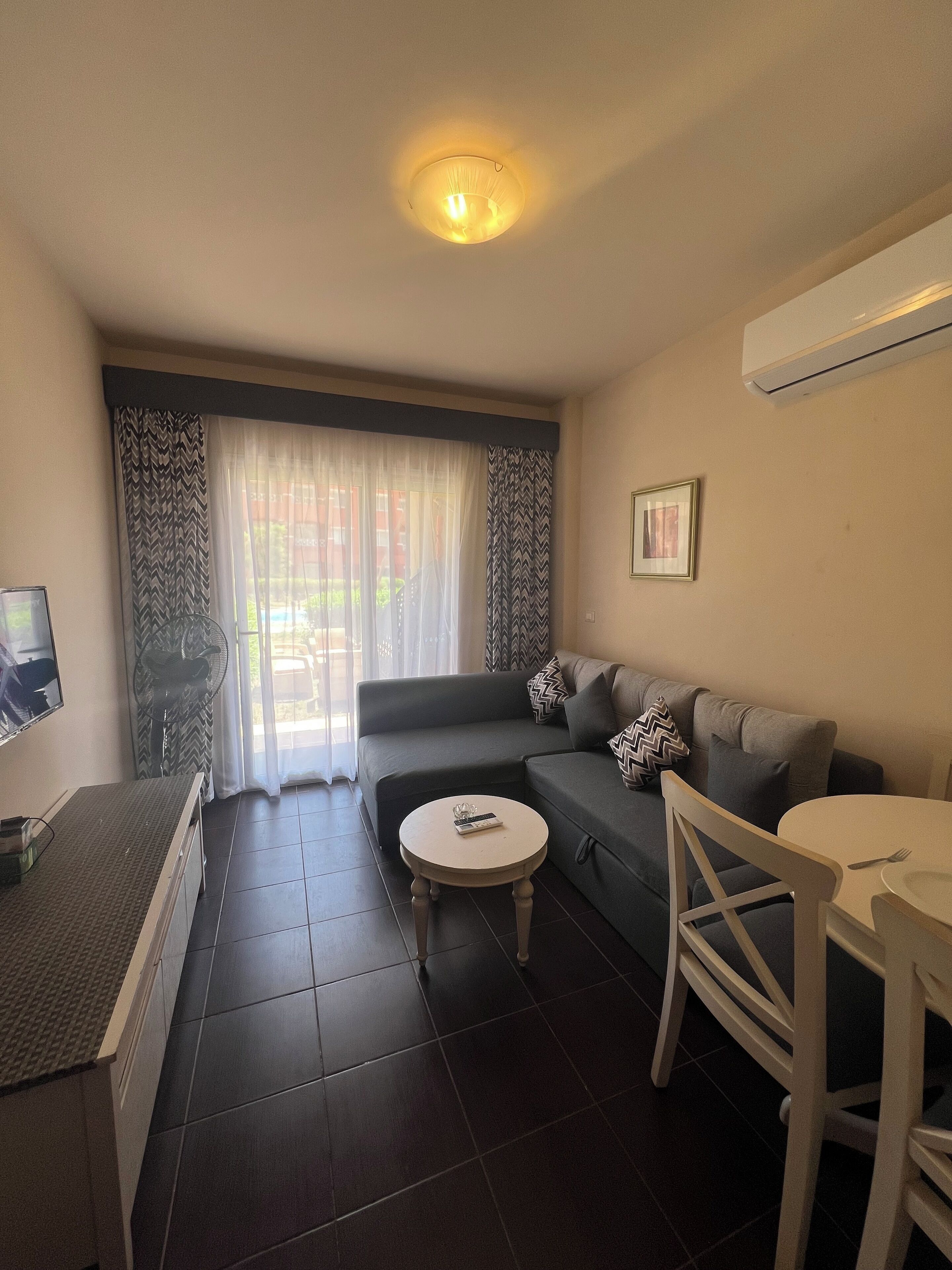 Junior Chalet | Living area | Plasma TV, fireplace