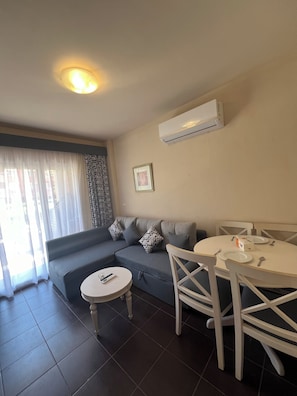 Junior Chalet | Living area | Plasma TV, fireplace