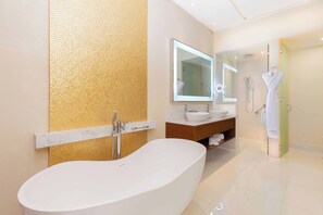 Shower, jetted tub, hair dryer, towels