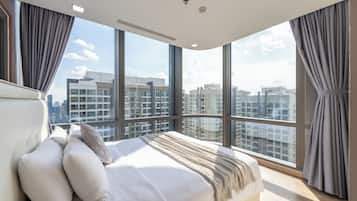 Deluxe Apartment, 2 Bedrooms, City View | Premium bedding, in-room safe, desk, laptop workspace