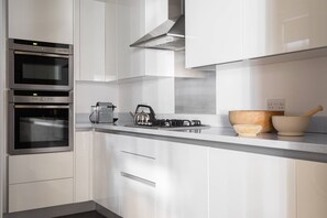 Fridge, microwave, dishwasher, coffee/tea maker