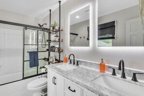 Hair dryer, towels, soap, shampoo