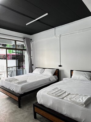 Family Room, Multiple Beds, Beach View | Free WiFi, bed sheets - Sleep Owl Jomtien (Pattaya)