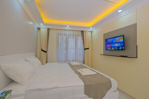 Ropa de cama de alta calidad y minibar 