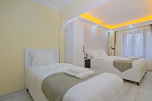 Ropa de cama de alta calidad y minibar 