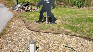 A welcome sign for the Getaway Escape with a silhouette of a person walking.