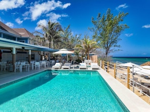 Outdoor pool, pool umbrellas, sun loungers