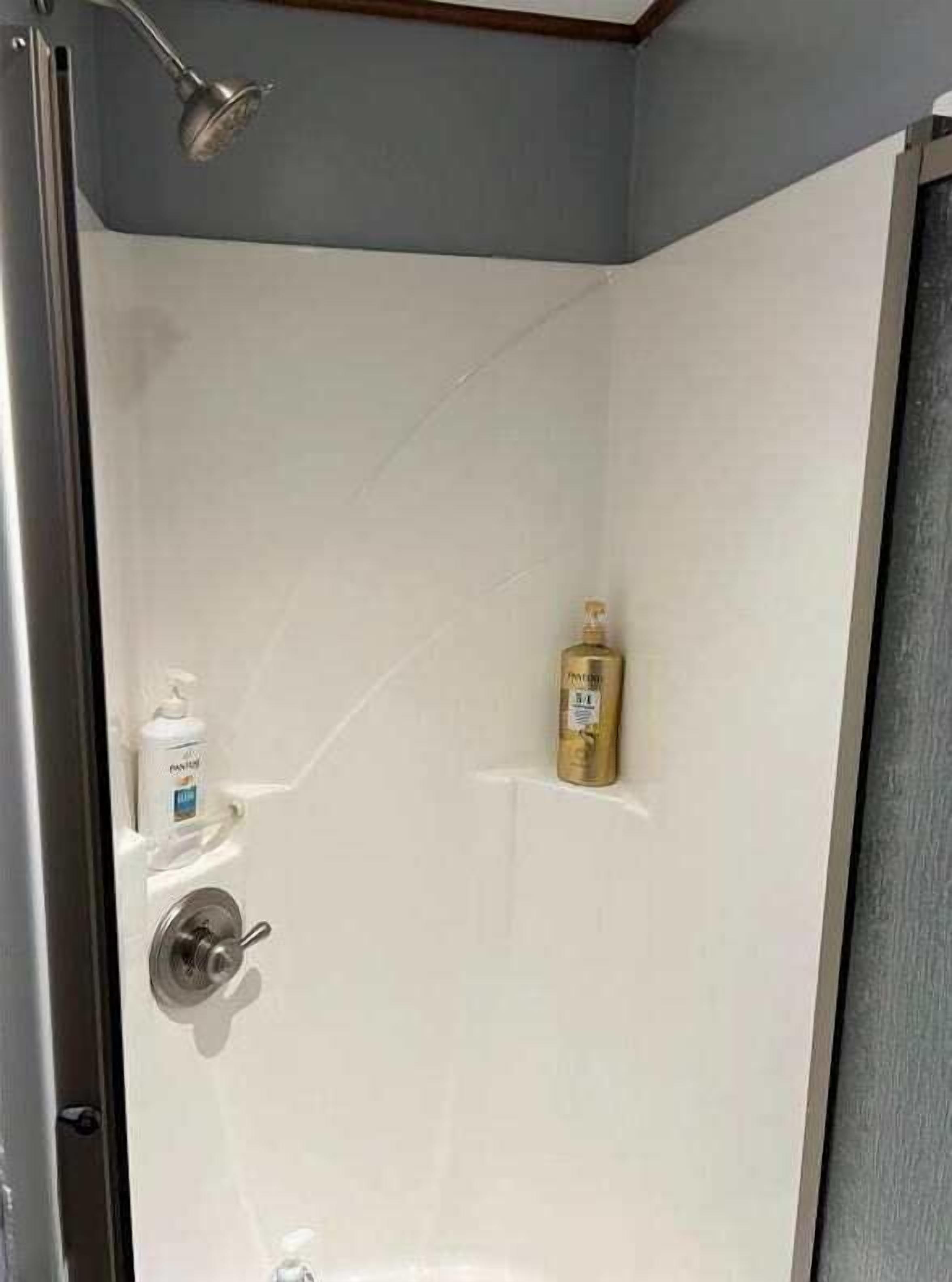 Shower, hair dryer, shampoo