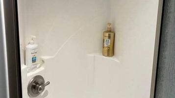 Shower, hair dryer, shampoo