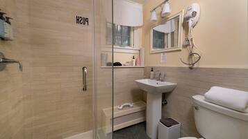 Shower, hair dryer, towels