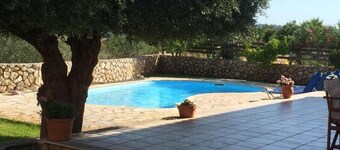 Peaceful villa in typical Kefalonian village. Close to beautiful St Thomas` Bay.