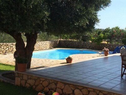 Peaceful villa in typical Kefalonian village. Close to beautiful St Thomas` Bay.