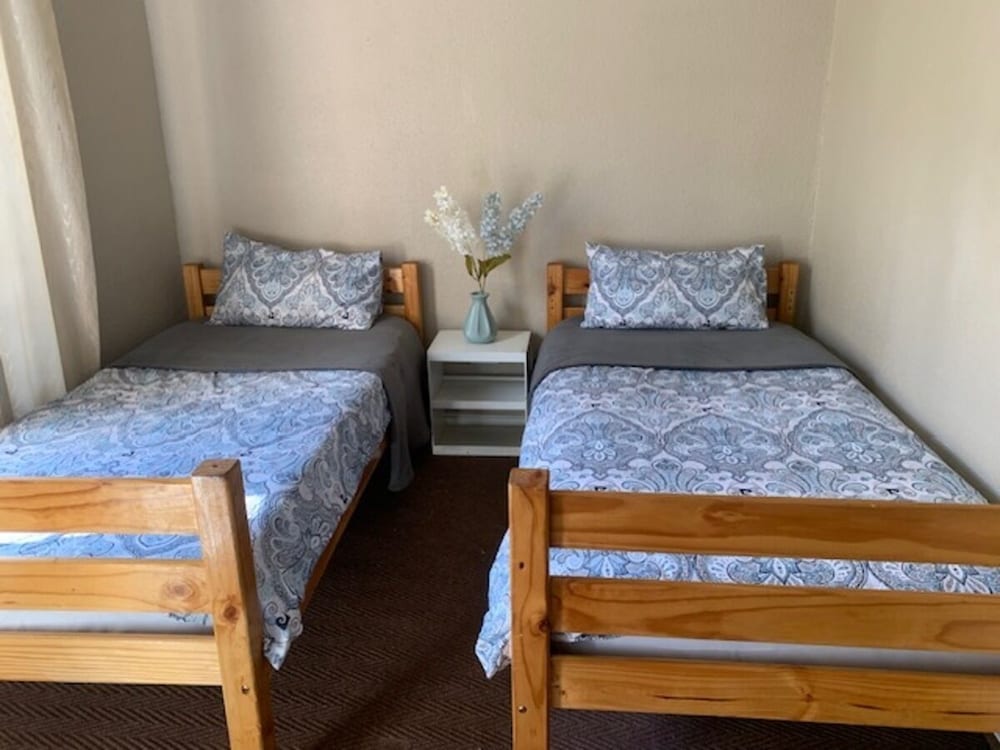 Entire 2 bedroom Duplex with wrap around garden in a secure complex