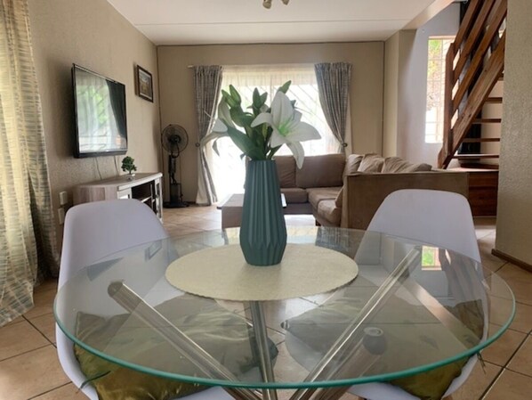 Living area - Entire 2 bedroom Duplex with wrap around garden in a secure complex (johannesburg)
