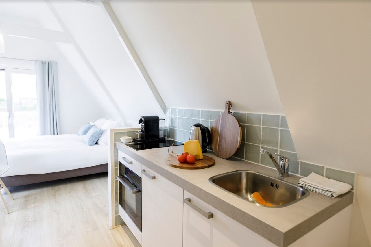 Standard Studio | Living area | 32-inch Smart TV with digital channels, Netflix, streaming services