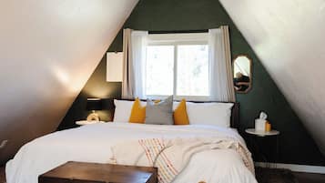 1 bedroom, desk, iron/ironing board, travel crib