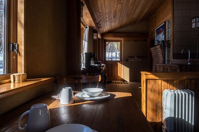 Straw clay sauna house on organic farm