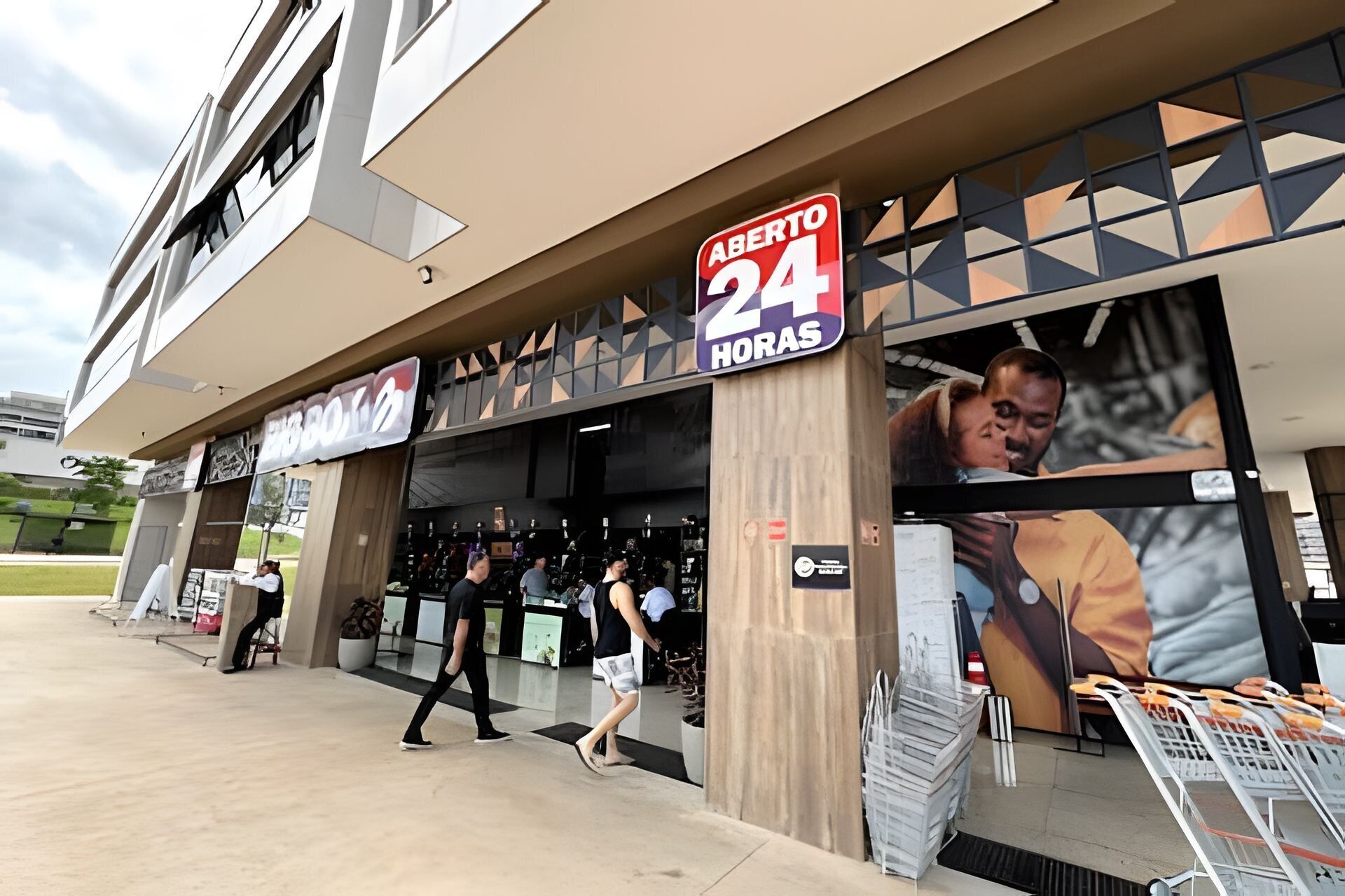 A store with a sign indicating it is open 24 hours.