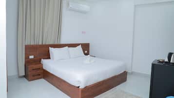 Ropa de cama de alta calidad, colchones con efecto memoria y minibar