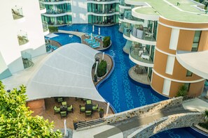 3 Außenpools, Sonnenschirme, Liegestühle