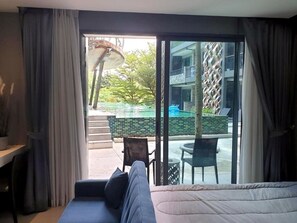 Design Studio, Pool Access | Terrace/patio - Apartment at Emerald Terrace by Lofty (Patong)
