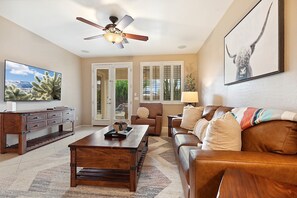 TV, fireplace, books, offices