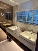 Room (01 Wispy Umbrella Orchid) | Bathroom | Separate tub and shower, rainfall showerhead, hair dryer, slippers