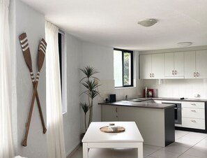 Apartamento família | Área de estar