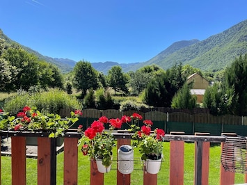View of gardens and mountains from front balcony of sitting room and bedroom 1