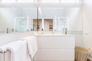Shower, hair dryer, shampoo