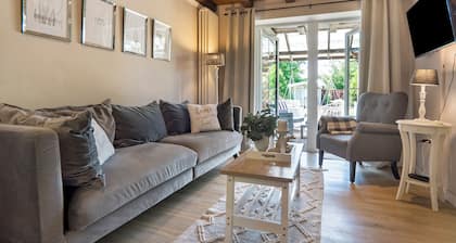 Cottage and Garden Lakefront House with Sauna