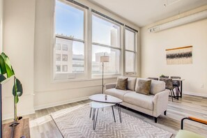 Apartment | Living area | 43-inch Smart TV with digital channels, Netflix, Hulu - TWO CozySuites Apt w Skybridge Access 3 (Indianapolis)