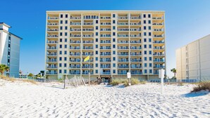 A multi-story hotel with balconies, located on a sandy beach. - Book Boardwalk 783 – Breathtaking Gulf Views Await! (Gulf Shores)