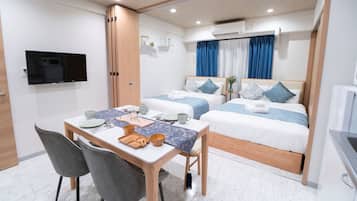 Classic Condo, 2 Double Beds, City View | 1 bedroom, blackout drapes, iron/ironing board, free WiFi