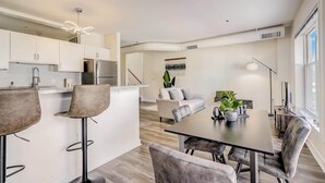 Apartment | Living area | 43-inch Smart TV with digital channels, Netflix, Hulu - TWO CozySuites Apt w Skybridge Access 4 (Indianapolis)
