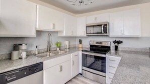 Apartment | Private kitchen | Coffee/tea maker, fridge, microwave, oven - TWO CozySuites Apt w Skybridge Access 4 (Indianapolis)