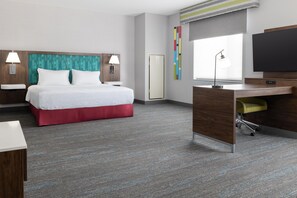 A hotel room with a bed, desk, and television. - Hampton Inn & Suites Porter Ranch Los Angeles (Porter Ranch)