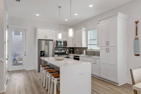 Fridge, microwave, dishwasher, coffee/tea maker