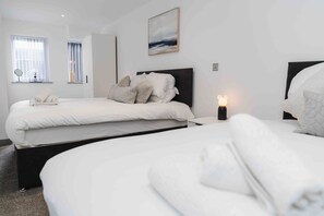 2 bedrooms, desk, iron/ironing board, travel cot