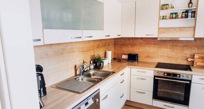 Family-friendly semi-detached house by the lake, only 200m to the beach