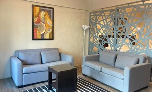 Deluxe Suite, Patio | Living area | TV - New Breakers Hotel Rawai (Rawai)