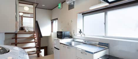 Casa tradicional | Cozinha privada | Geladeira, micro-ondas, cooktop, chaleira elétrica