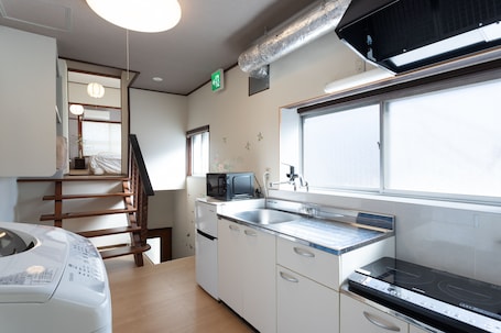 Traditional House | Private kitchen | Fridge, microwave, stovetop, electric kettle