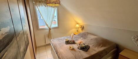 1 bedroom, desk, iron/ironing board, travel cot