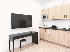 Flat-screen TV - Apartamentos La Brava by gaiarooms  (Salamanca)