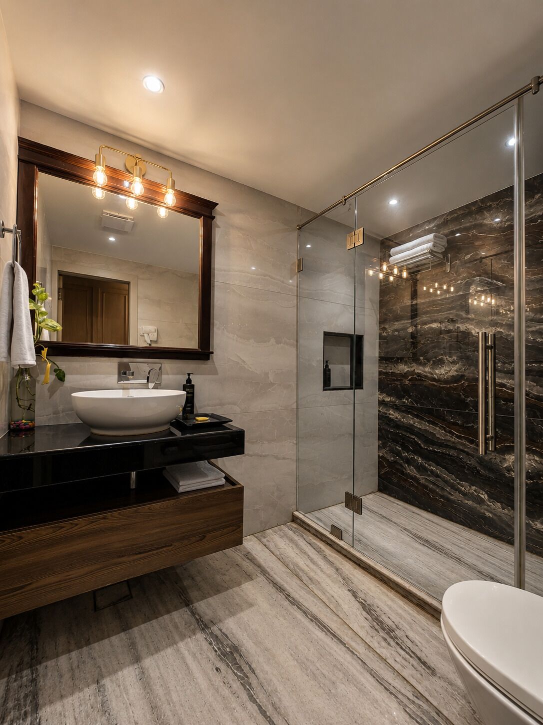 A modern bathroom with a large mirror, a white sink, and a glass-enclosed shower.