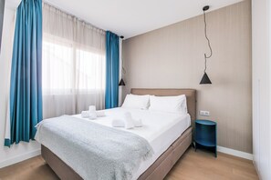 Familie suite | Een kluis op de kamer, individueel gedecoreerd, individueel gemeubileerd