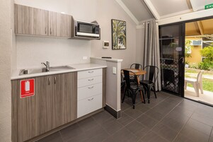 Superior Poolside Studio | Private kitchen | Microwave, stovetop, toaster, cookware/dishes/utensils