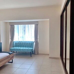 Deluxe Room | 1 bedroom, desk, laptop workspace, free WiFi