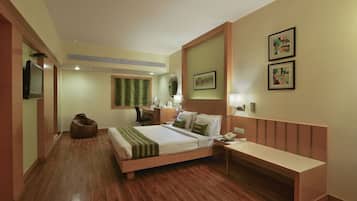 Executive Room | 1 bedroom, minibar, in-room safe, individually decorated